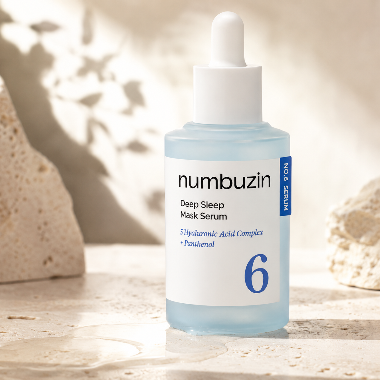Numbuzin No.6 Deep Sleep Mask Serum 50ml displayed on warm travertine with soft morning sunlight in a premium Korean skincare hero photo.