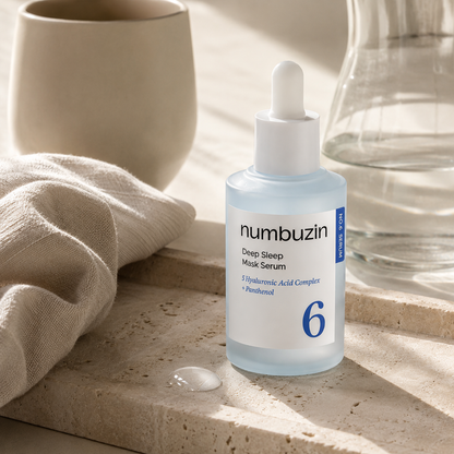 Numbuzin No.6 Deep Sleep Mask Serum 50ml styled with beige linen, ceramic cup, glass vessel, and warm travertine in a calm Gaia-style skincare vanity scene.