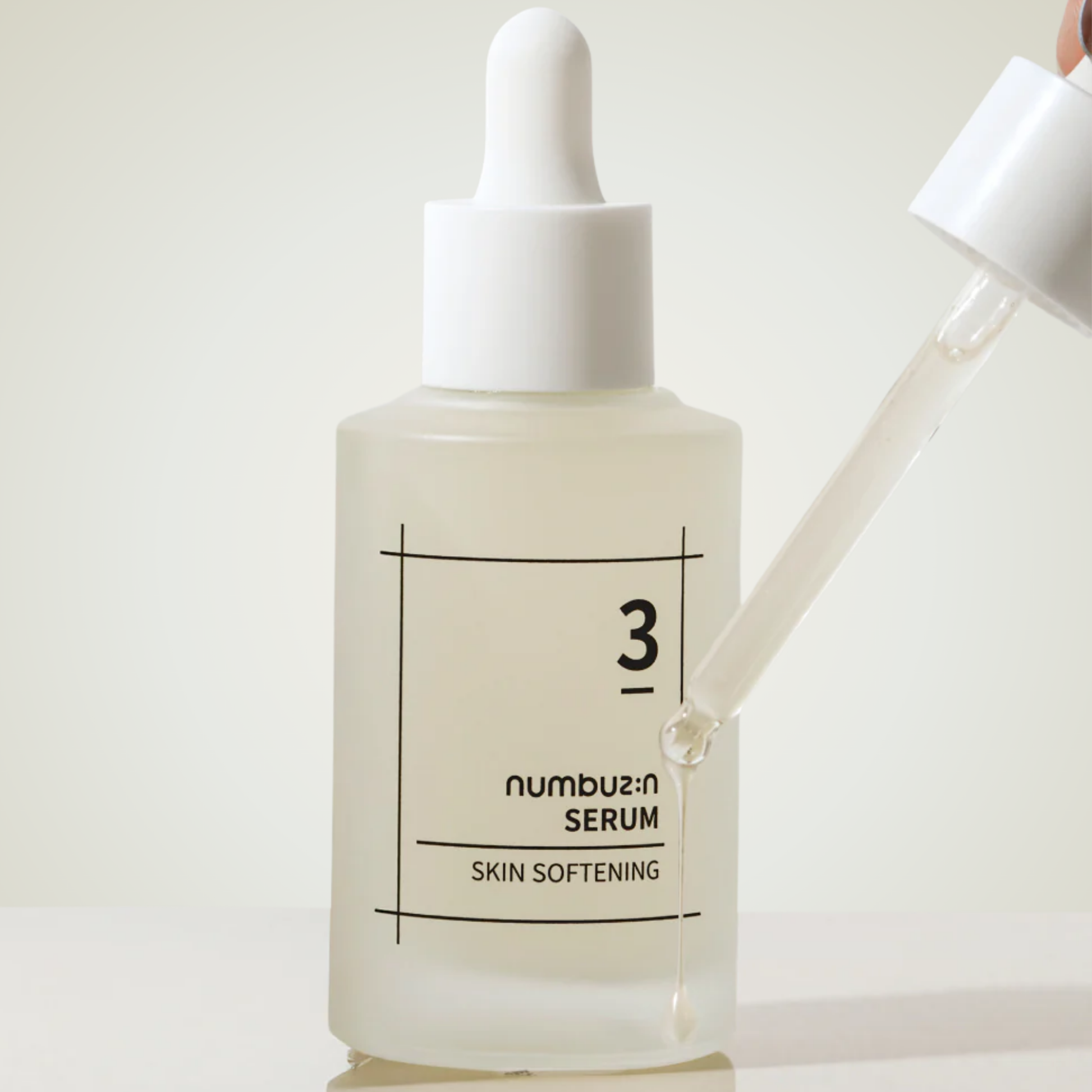 Dropper of Numbuzin No.3 Skin Softening Serum applying on skin – softening and hydrating formula