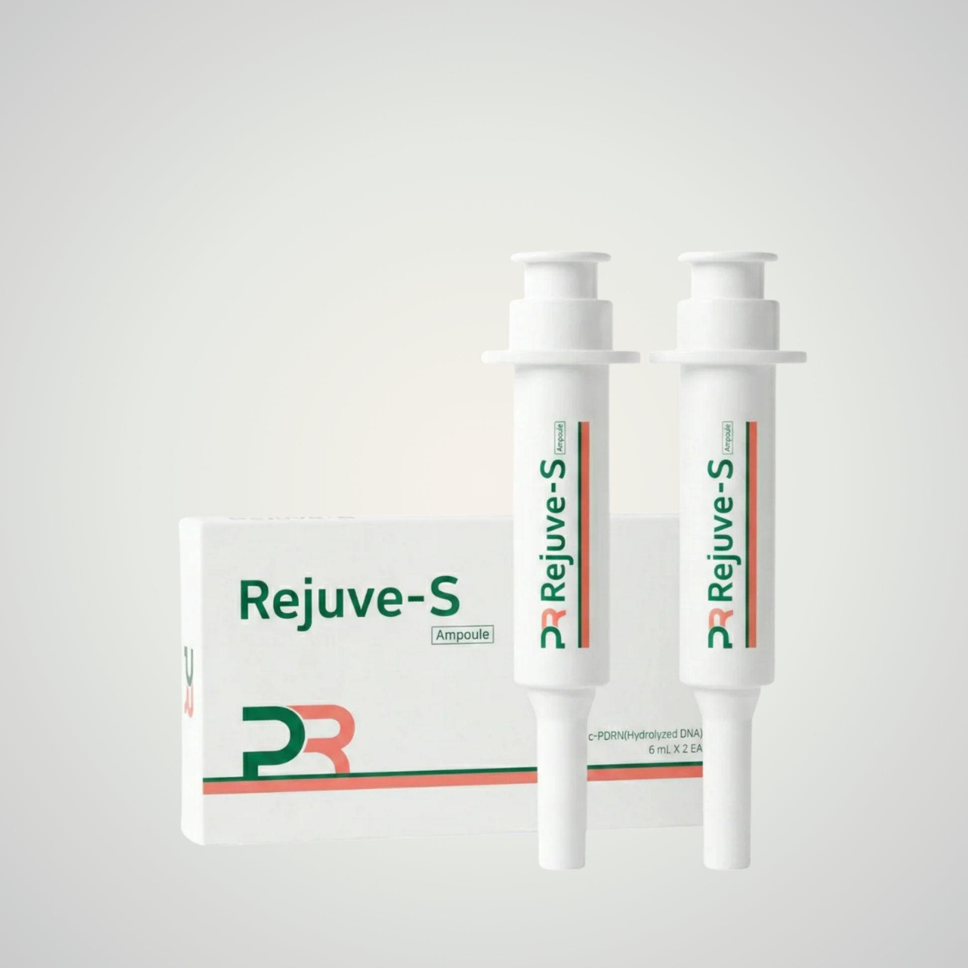Two white Rejuve-S ampoules standing upright next to their white packaging box, featuring green and orange branding on a light gray background.