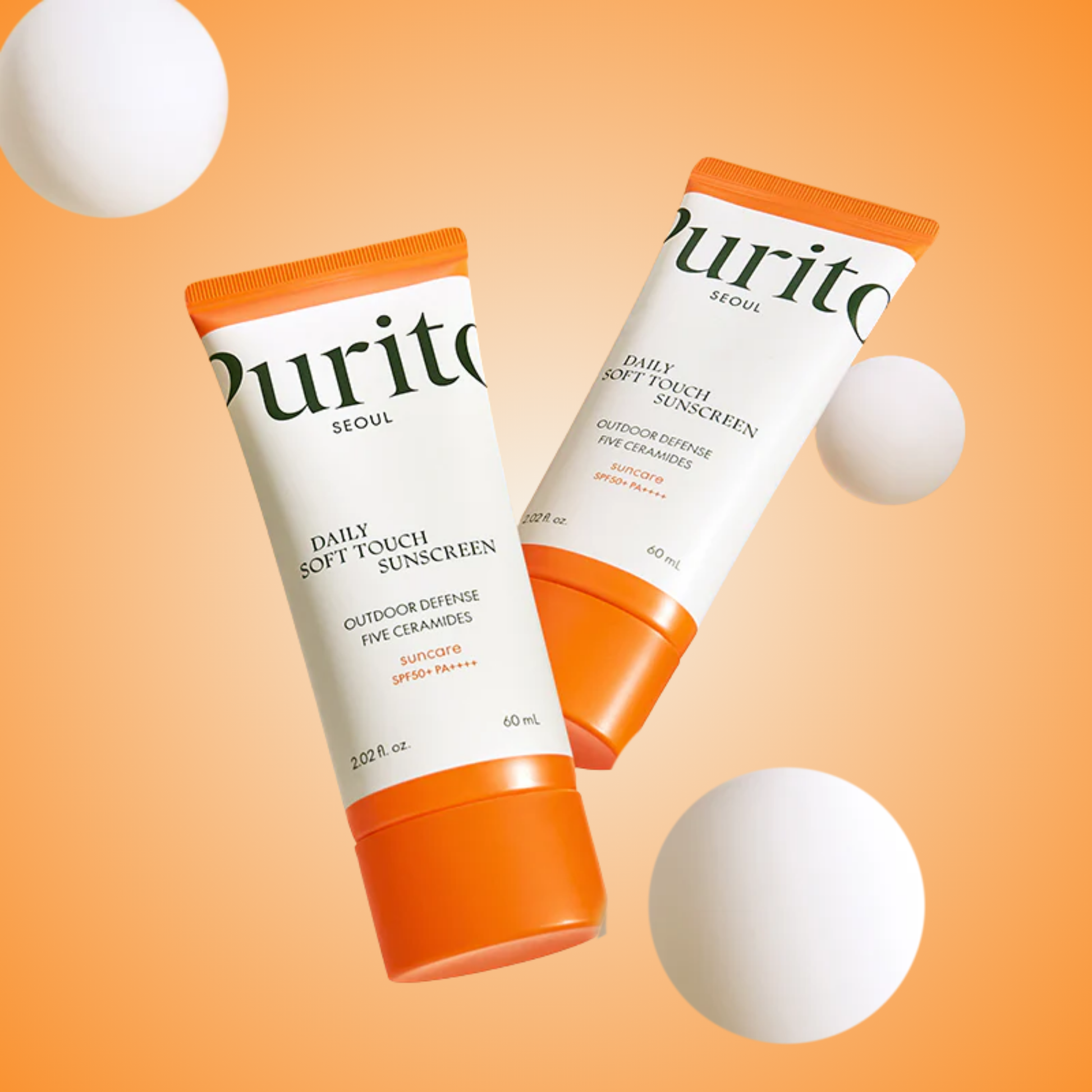 Purito SEOUL Daily Soft Touch Sunscreen SPF50+ PA++++ duo display – bright orange minimalist aesthetic