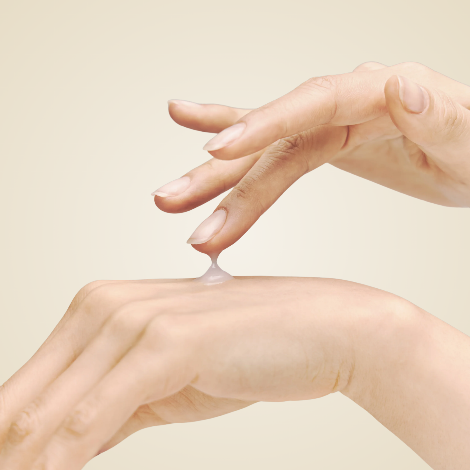 REJUALL Advanced PDRN Repair Cream applied on hand – soothing care for dry or damaged skin.