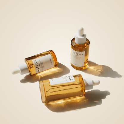 SKIN1004 Madagascar Centella Ampoule 55ml styled with multiple bottles – calming serum for everyday skin repair.