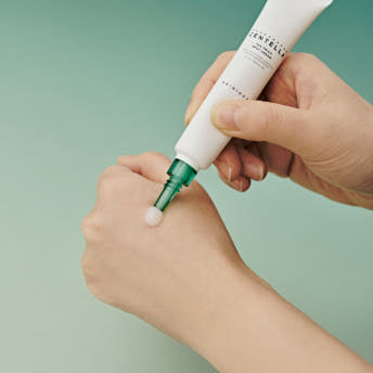 SKIN1004 Madagascar Centella Tea-Trica Spot Cream 20ml — spot cream applied to the back of a hand.