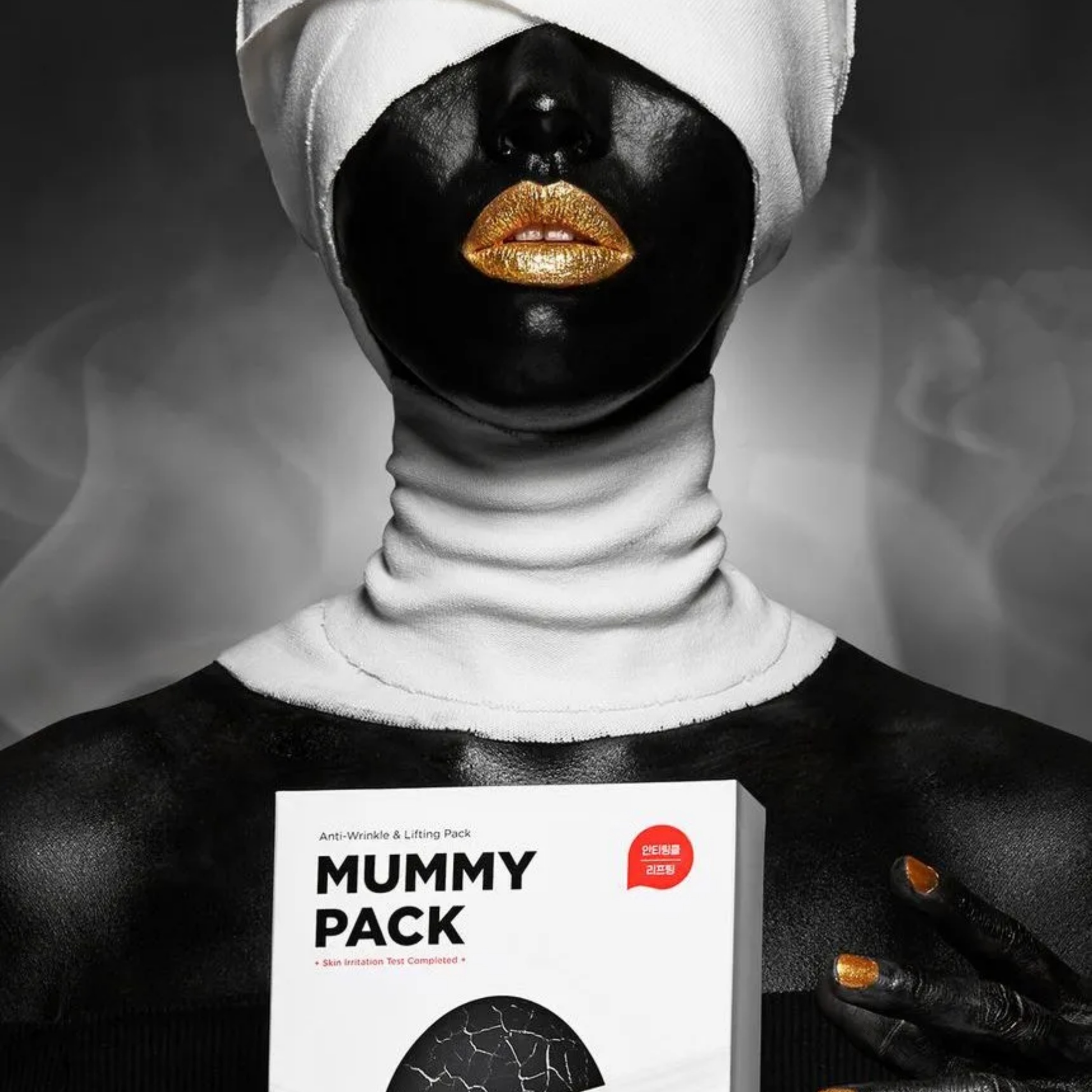 Model holding SKIN1004 Zombie Beauty Mummy Pack kit with artistic mask look