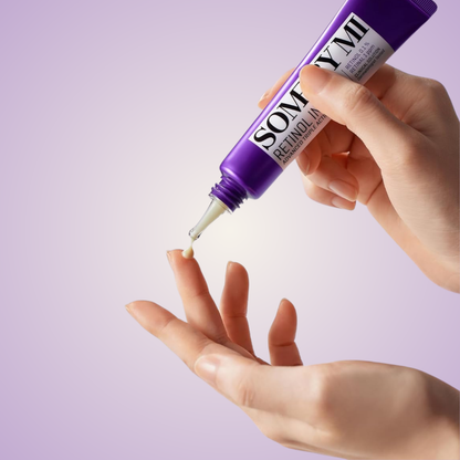 Applying SOME BY MI Retinol Intense Advanced Triple Action Eye Cream on fingertip for under-eye care