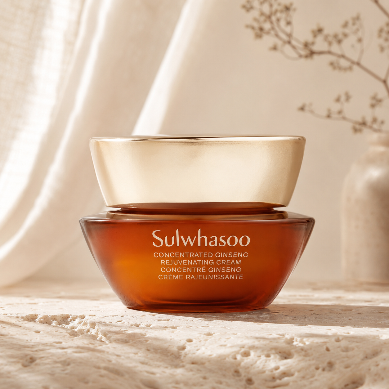 Sulwhasoo Concentrated Ginseng Rejuvenating Cream displayed on warm travertine with soft morning sunlight in a luxury Korean skincare hero photo.