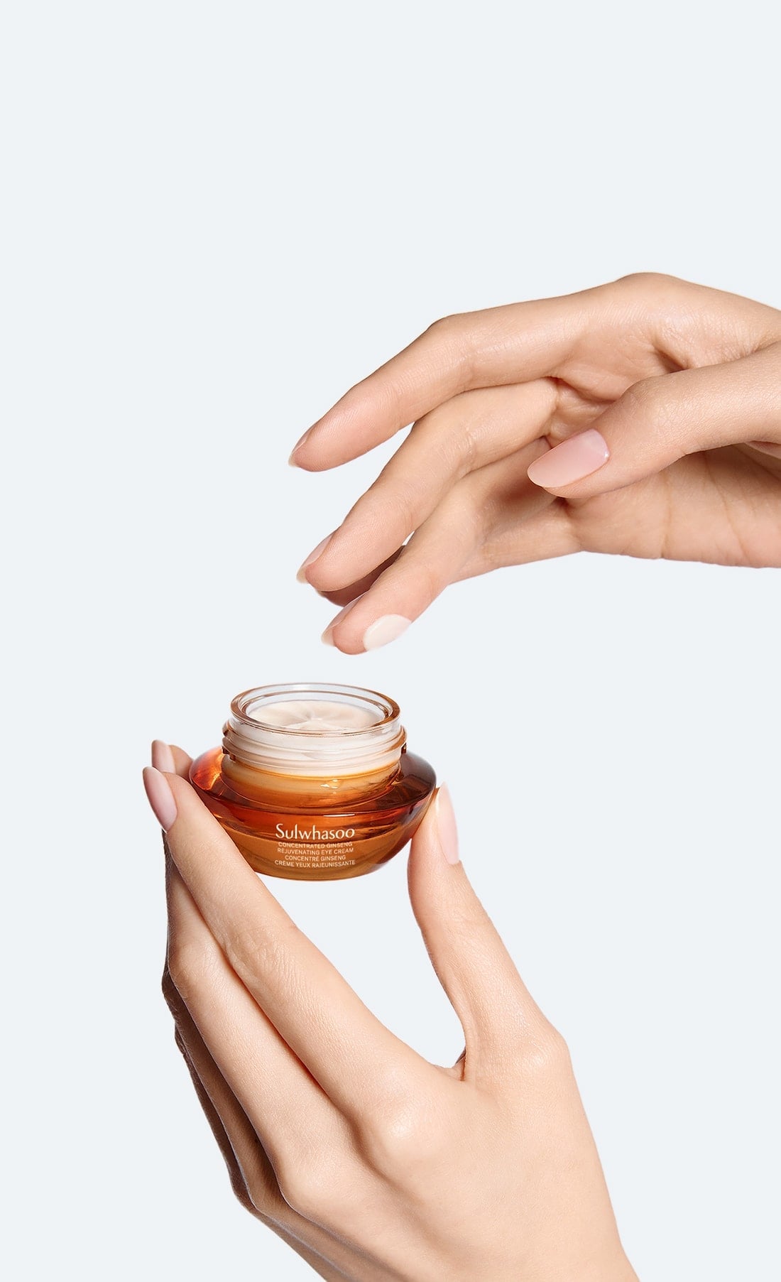 Applying Sulwhasoo Concentrated Ginseng Rejuvenating Eye Cream for under eye care