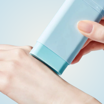 Applying TOCOBO Cotton Soft Sun Stick SPF50+ PA++++ on hand – smooth lightweight sunscreen glide