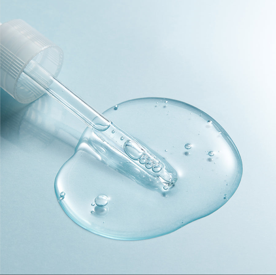 Dropper dispensing Torriden DIVE-IN Hyaluronic Acid Serum showing lightweight watery texture
