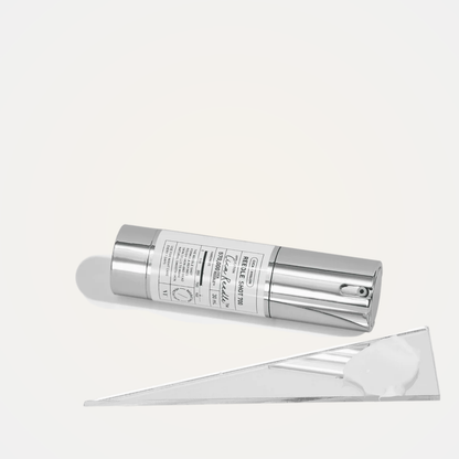 VT Reedle Shot 700 serum flatlay with minimalist mirror and white props – professional skincare display